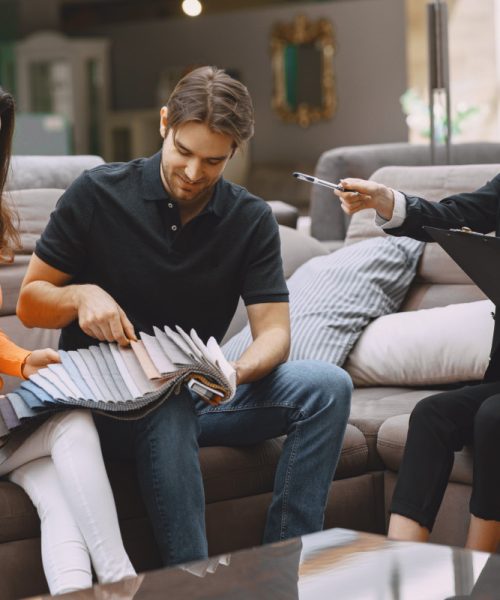 couple-choosing-fabric-furniture-store